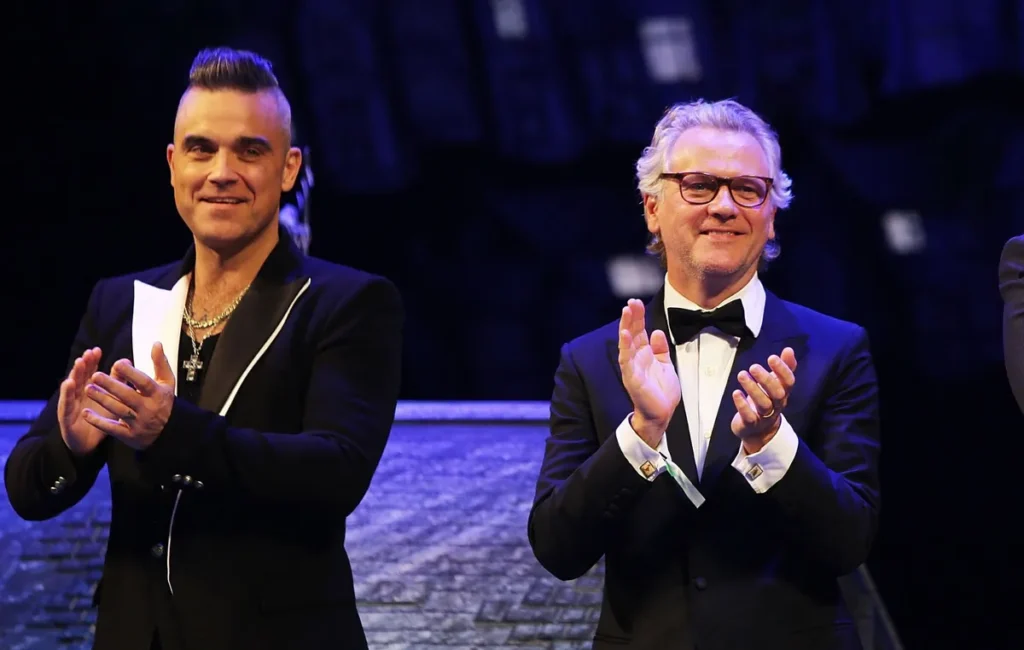 Robbie Williams Reunites with Guy Chambers in Emotional Liverpool Show