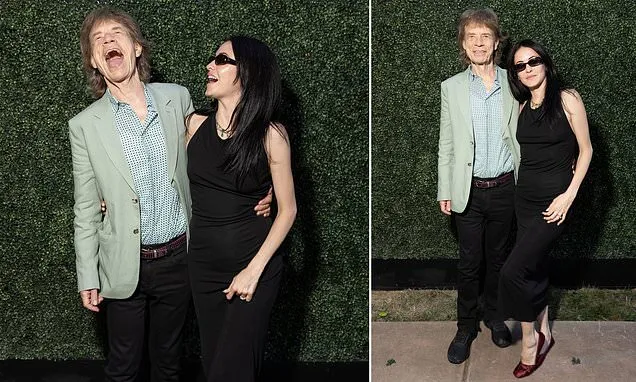 Mick Jagger Laughs with Fiancée Melanie Hamrick After World Cup Disappointment Mick Jagger Laughs with Fiancée Melanie Hamrick After World Cup Disappointment