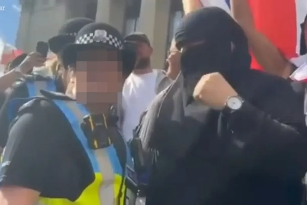 Man Arrested at Portsmouth Anti-Migrant Protest Over Face Covering Man Arrested at Portsmouth Anti-Migrant Protest Over Face Covering